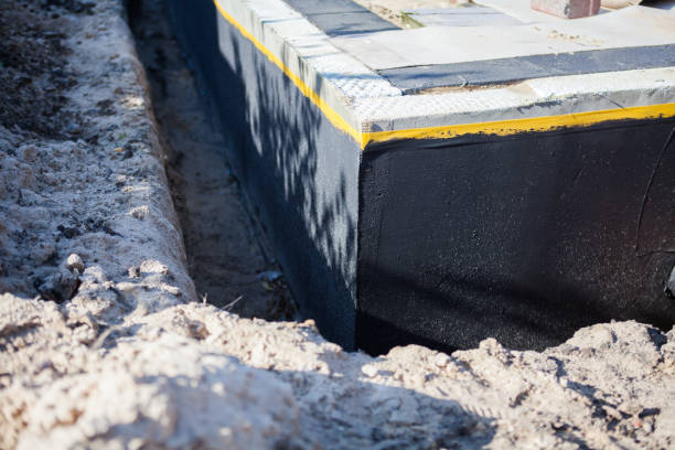 Professional Waterproofing technician working in Liberty, IN